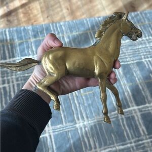 Elegant Gold Horse Sculpture